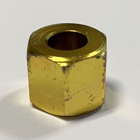 Écrou de serrage pour vis et gicleur à gaz